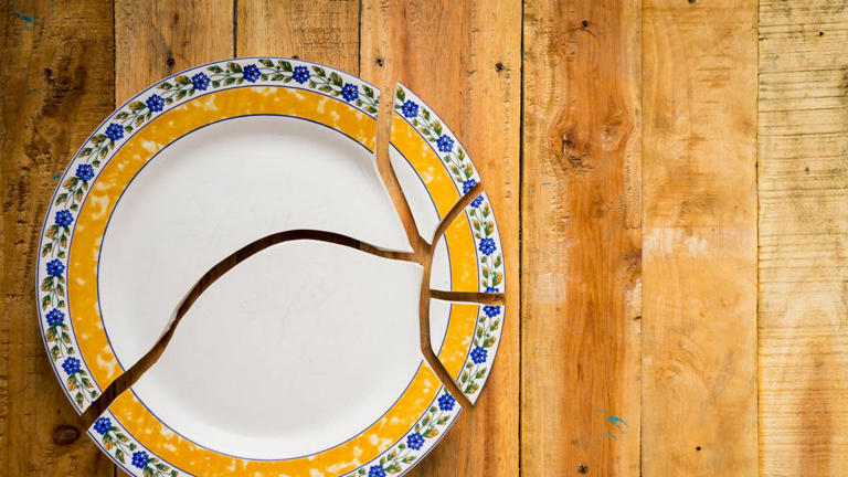 This whimsical mosaic backsplash is made entirely from broken dishes