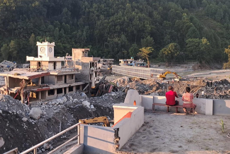 Devoid of options, flood survivors return to damaged homes