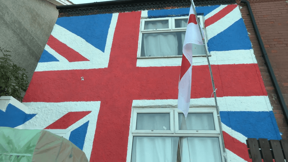 Father who painted Union Jack on house banned from dressing as Santa ...