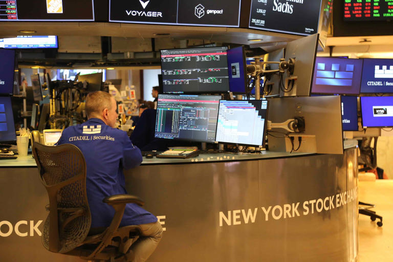 Stock market today: Major indexes end higher to begin busy week of tech ...
