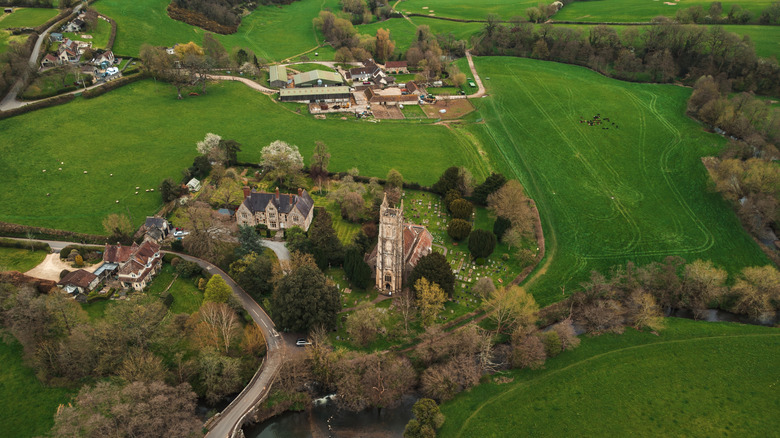 Between Barnstaple and Doniford is a village inside a national park ...