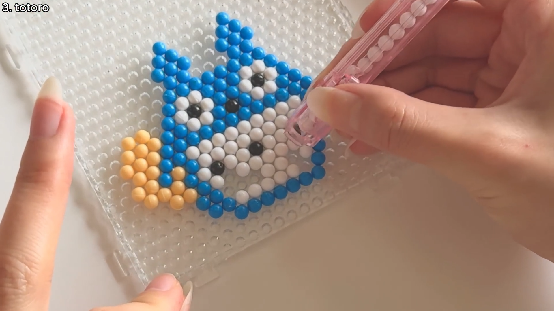 Artist tries different types of DIY candy bead art