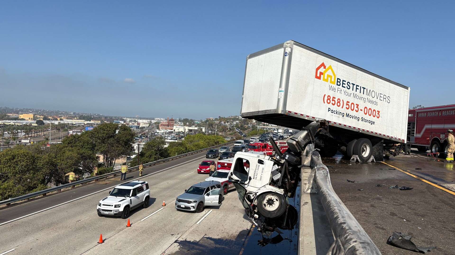 Its box stayed on I-5. Its cab hung off the side and caught fire ...