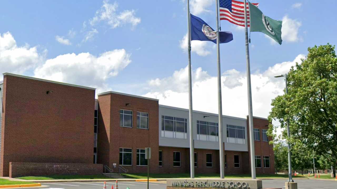 Virginia art teacher arrested after school gun discovery