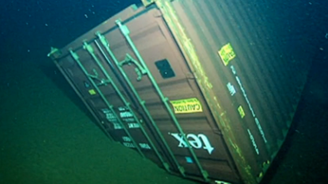 Underwater robot finds a sunken container during deep-sea exploration