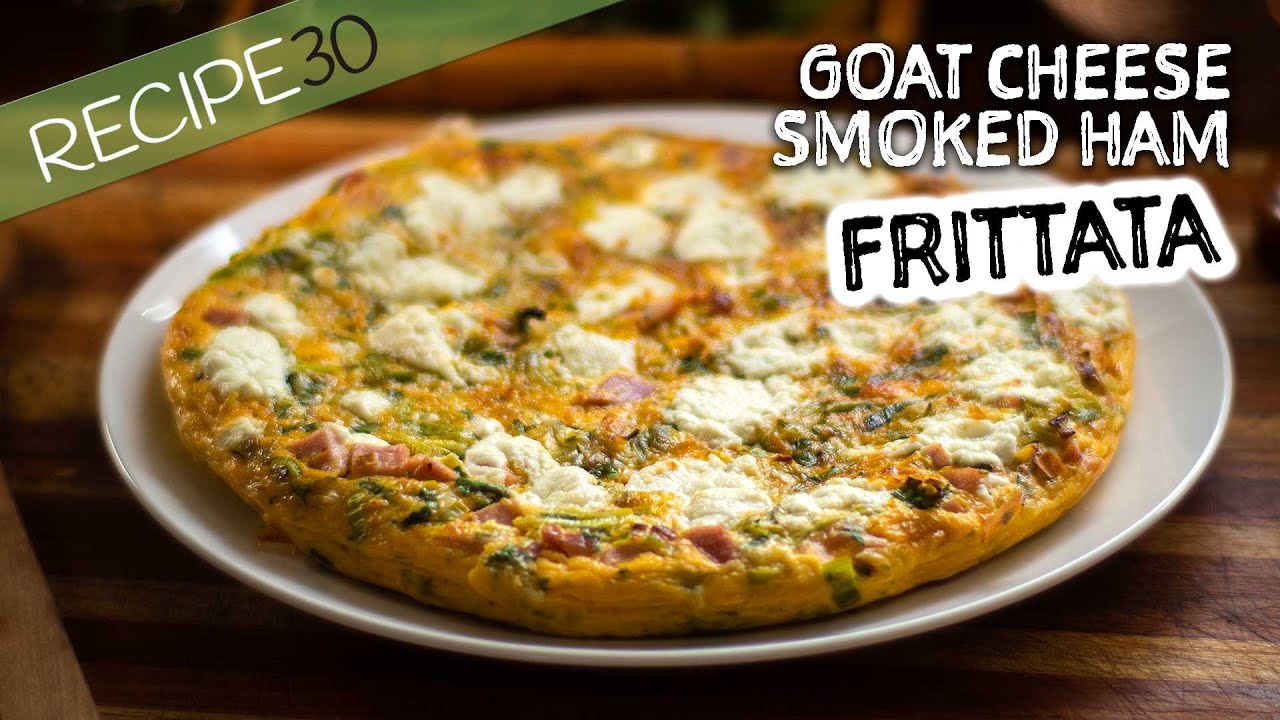 Easy frittata lunch! Filled with leek, smoked ham and goat cheese