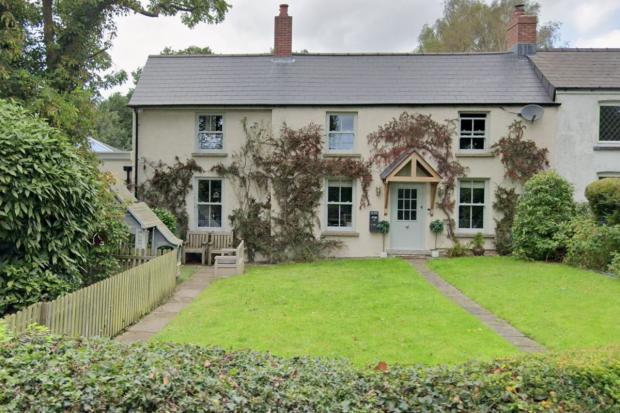 Cottage extension 'sprawling into' countryside green belt approved by ...