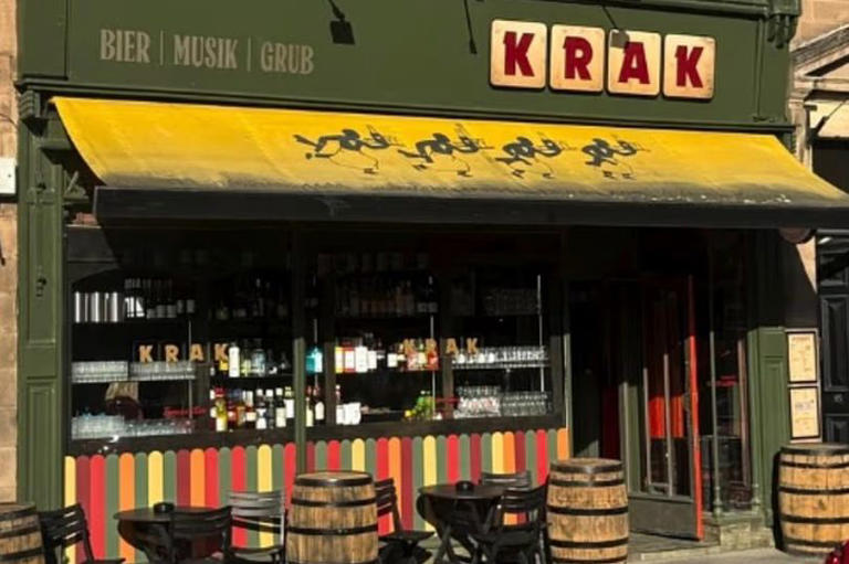 Thief caught on CCTV stealing table lamp from bar in plain sight