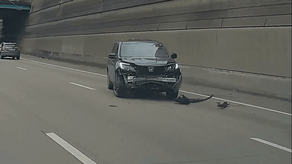 Man charged weeks after hit-and-run crash sends SUV into concrete wall