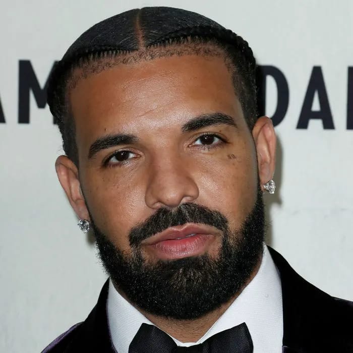 Drake goes viral after wearing a fringe shawl to his birthday party in NYC
