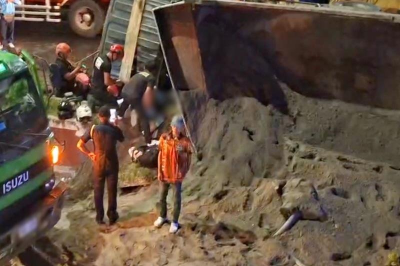 Rider, 11-month-old baby killed as dump truck tips over in Quezon City