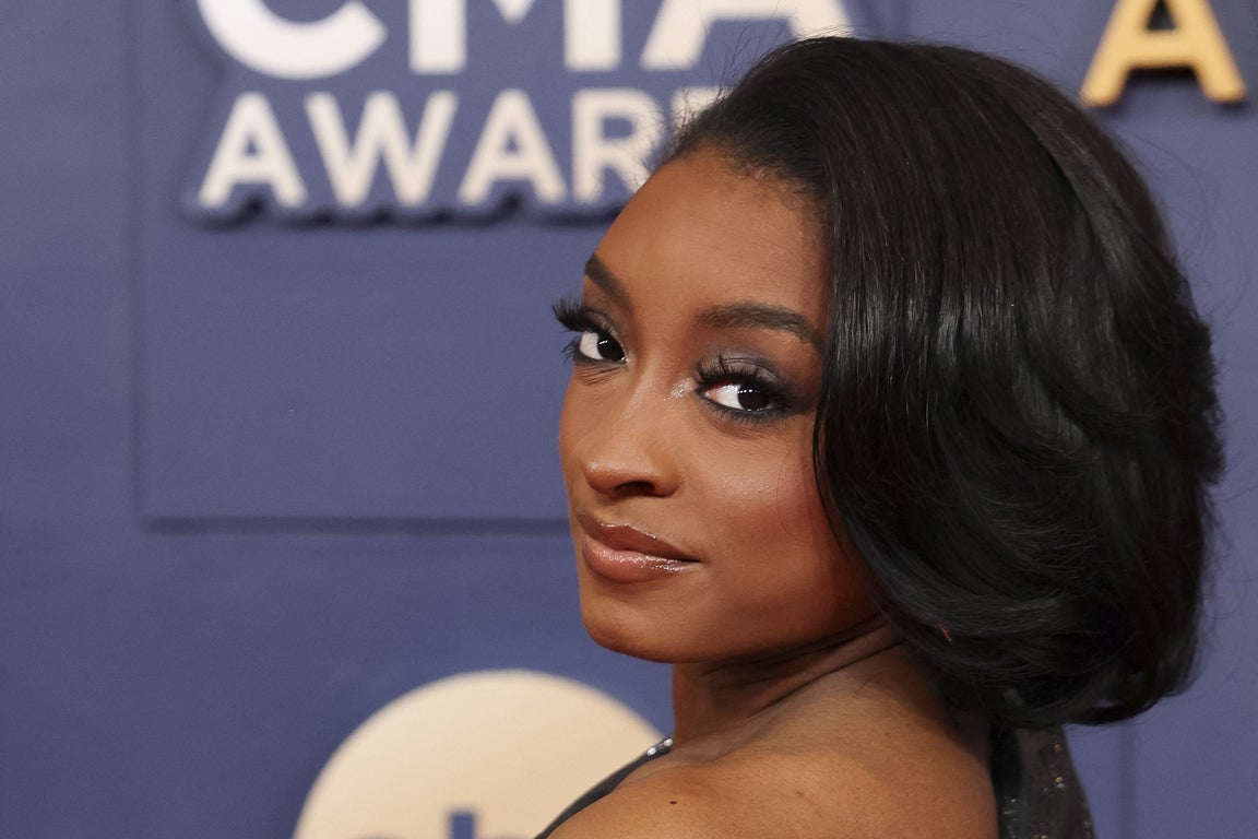 The most decorated gymnast and SI Swim model Simone Biles in photos