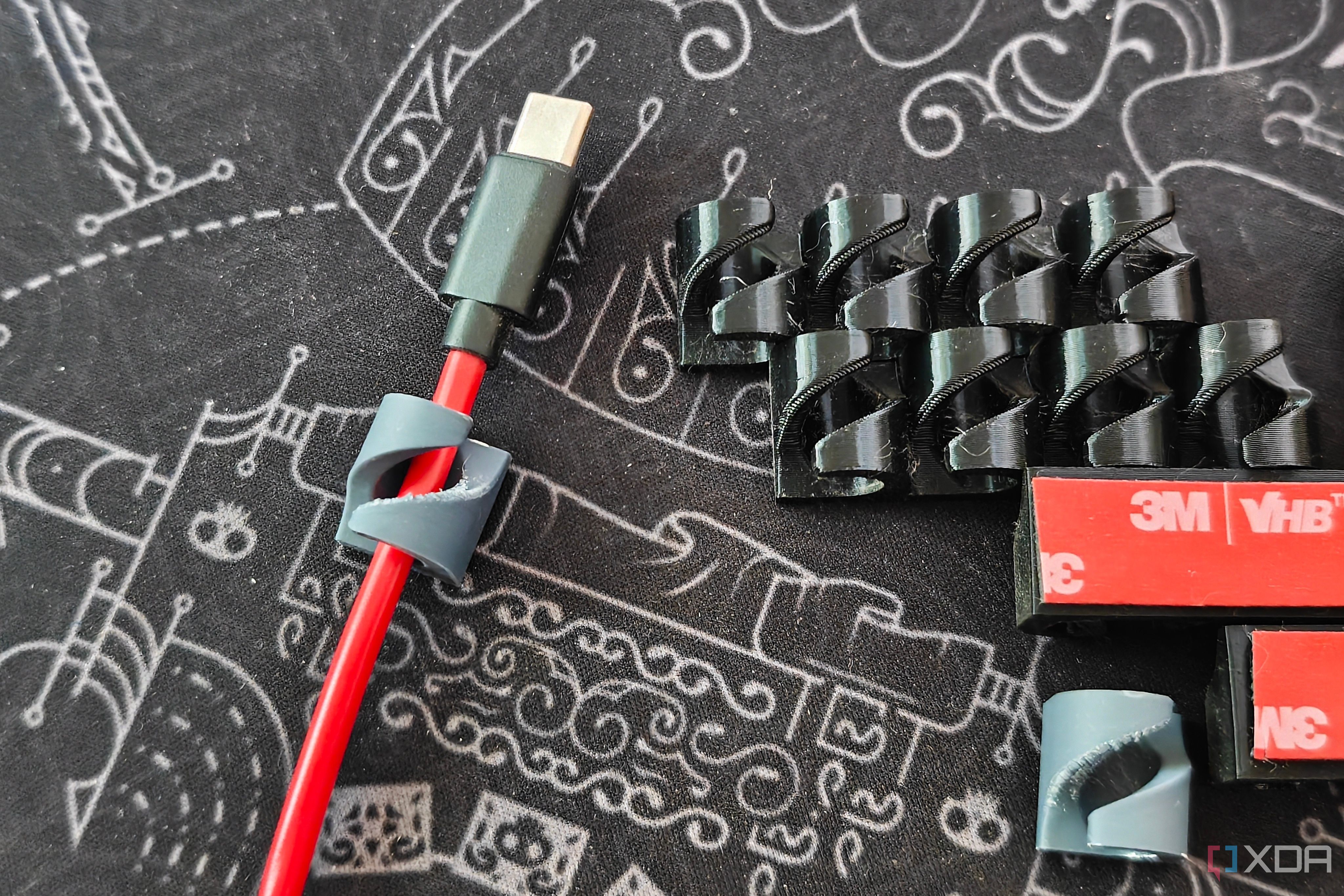 I stopped buying cable organizers once I started 3D printing my own