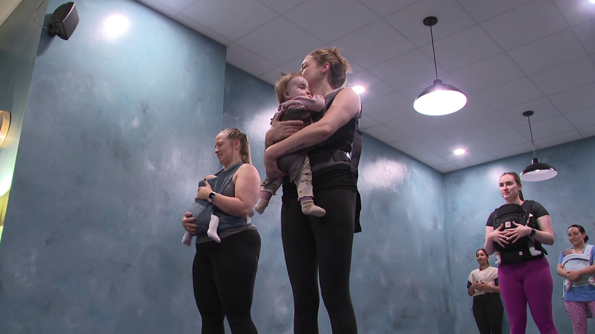 Core and carry class gives a new take on Pilates, having moms exercise ...