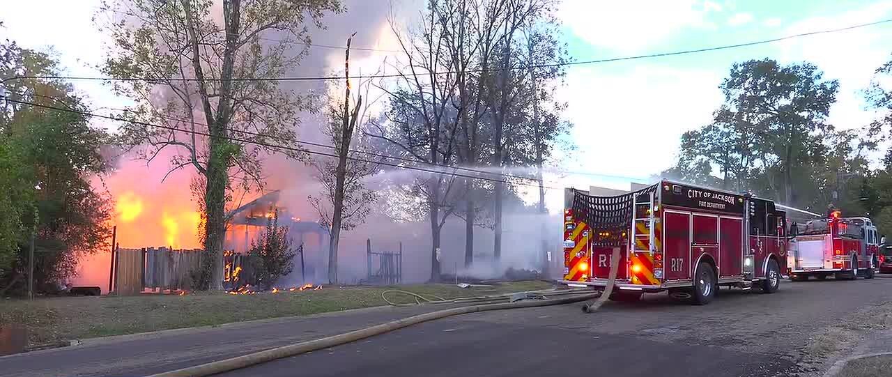 Jackson house fire leaves charred frame after car fire spreads to home