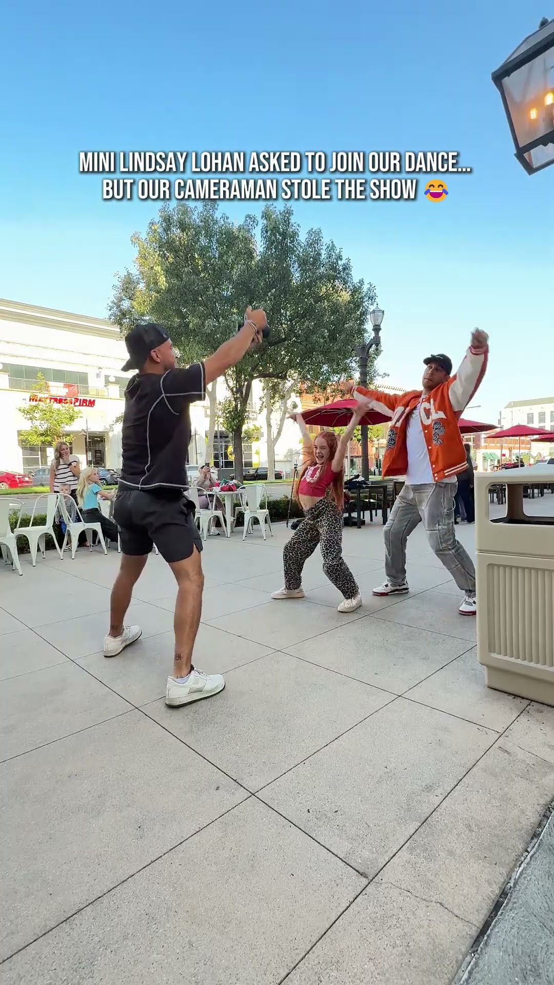 Cameraman steals the show while dancing
