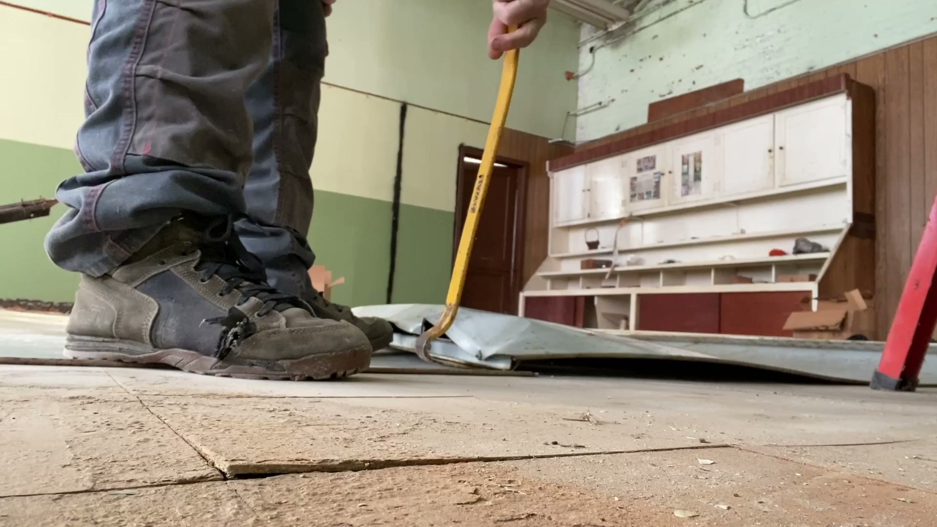 Abandoned building renovation: Cleaning out the front of the building