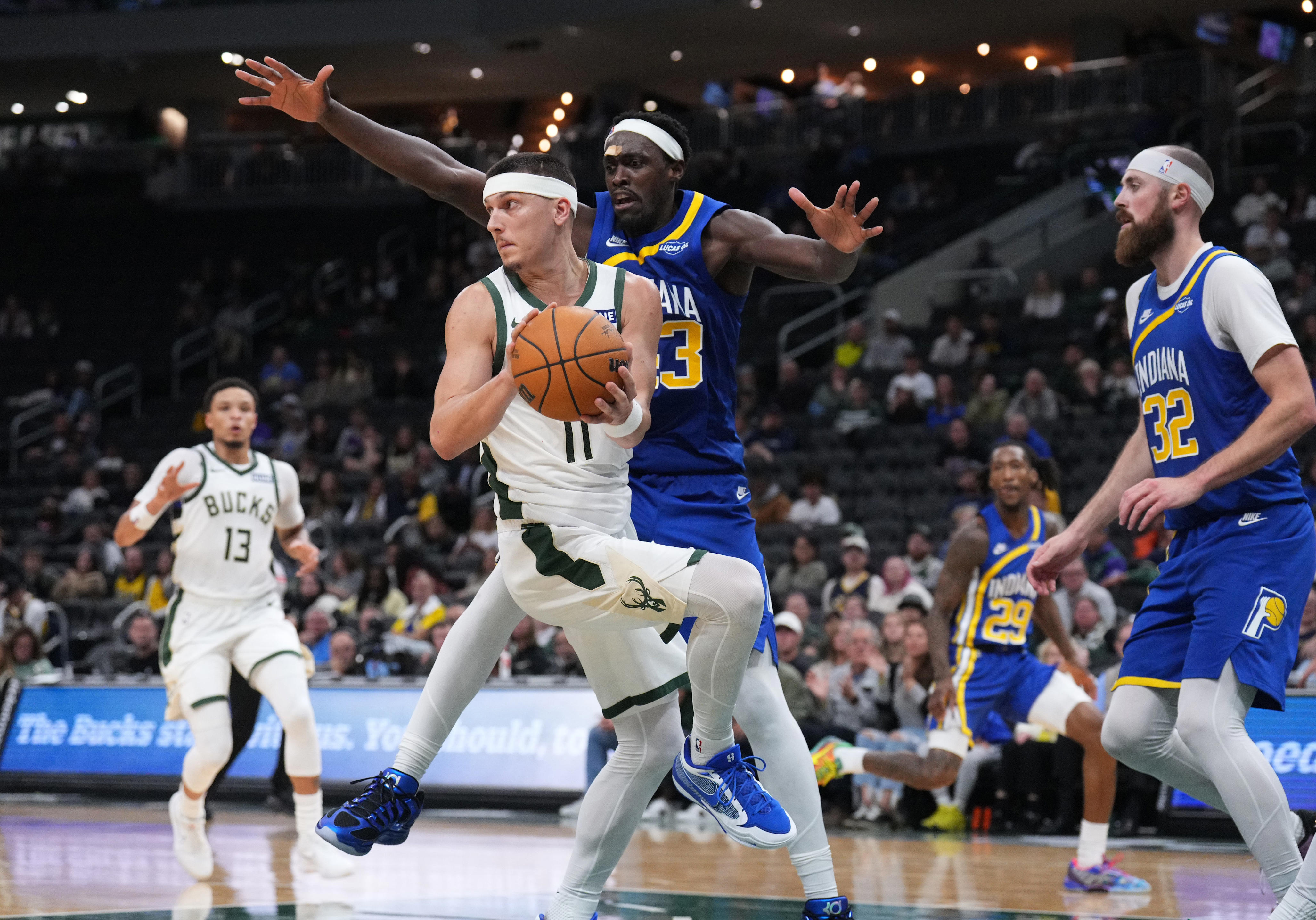 Milwaukee Bucks win first game of season, beat Indiana Pacers, 110-102
