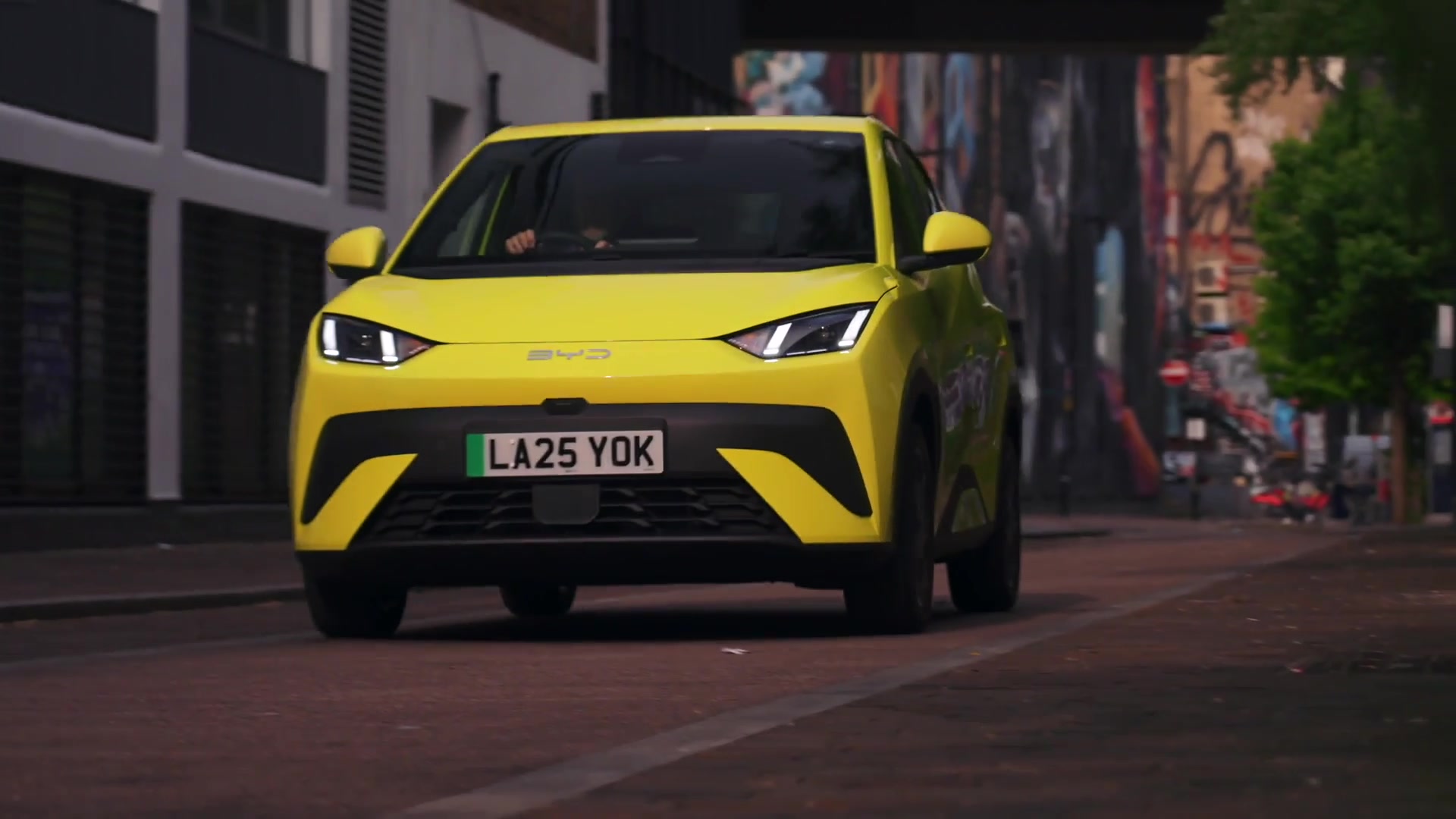 BYD Dolphin Surf in lime green driving video