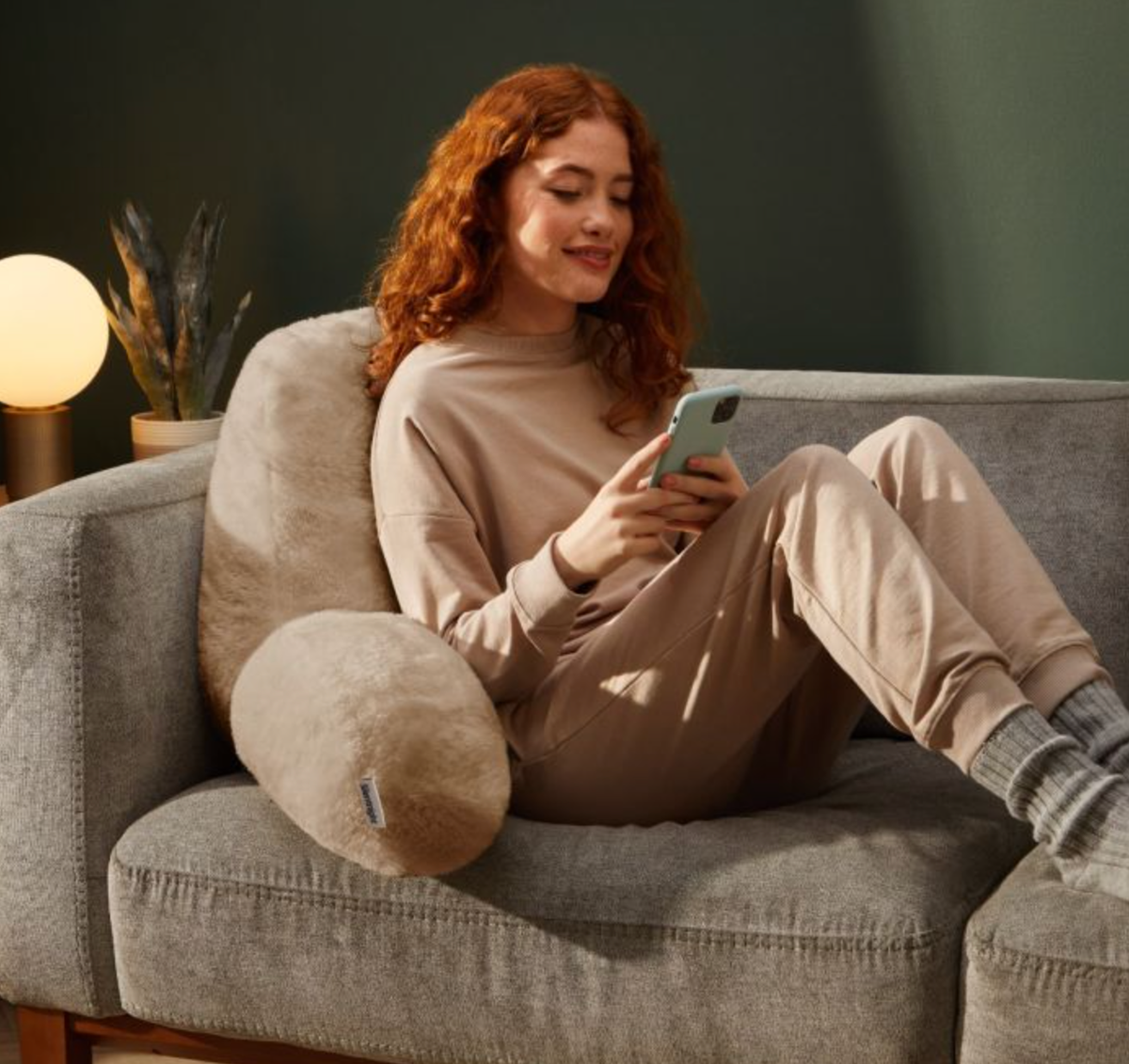 This USB-heated teddy bouclé cushion will keep you cosy without turning ...