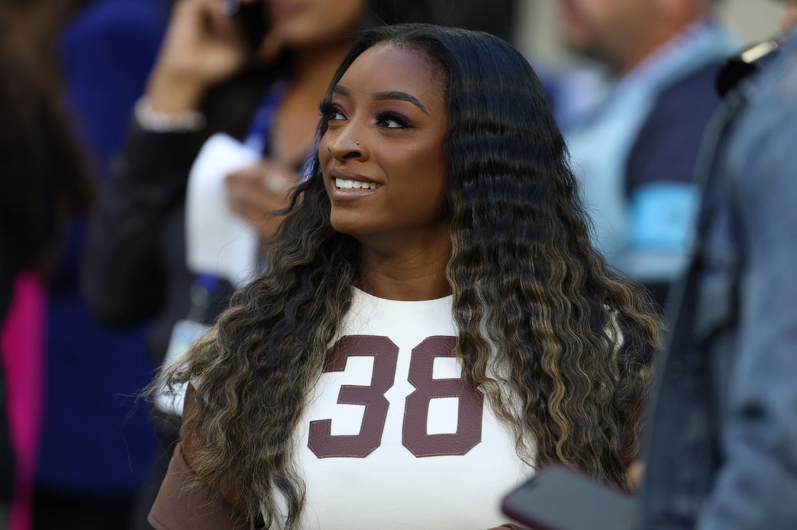 The most decorated gymnast and SI Swim model Simone Biles in photos
