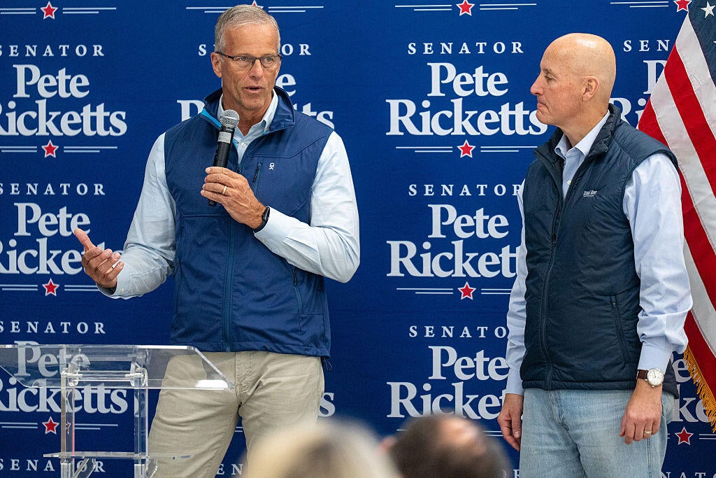 Thune and Ricketts in Fremont, Nebraska, on Oct. 20, 2026.  / Credit: Dylan Widger / Bloomberg via Getty Images