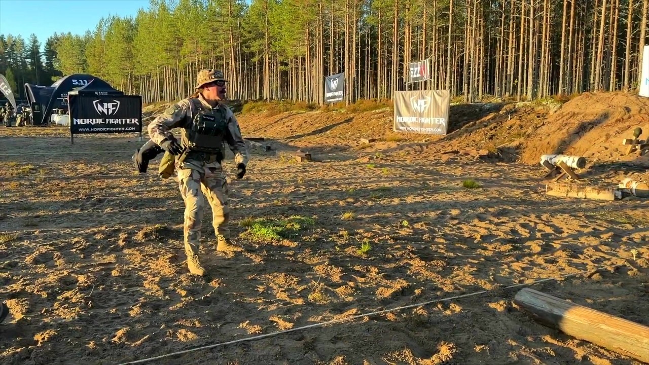 Man competes in a shooting challenge while wearing 26 pounds of gear