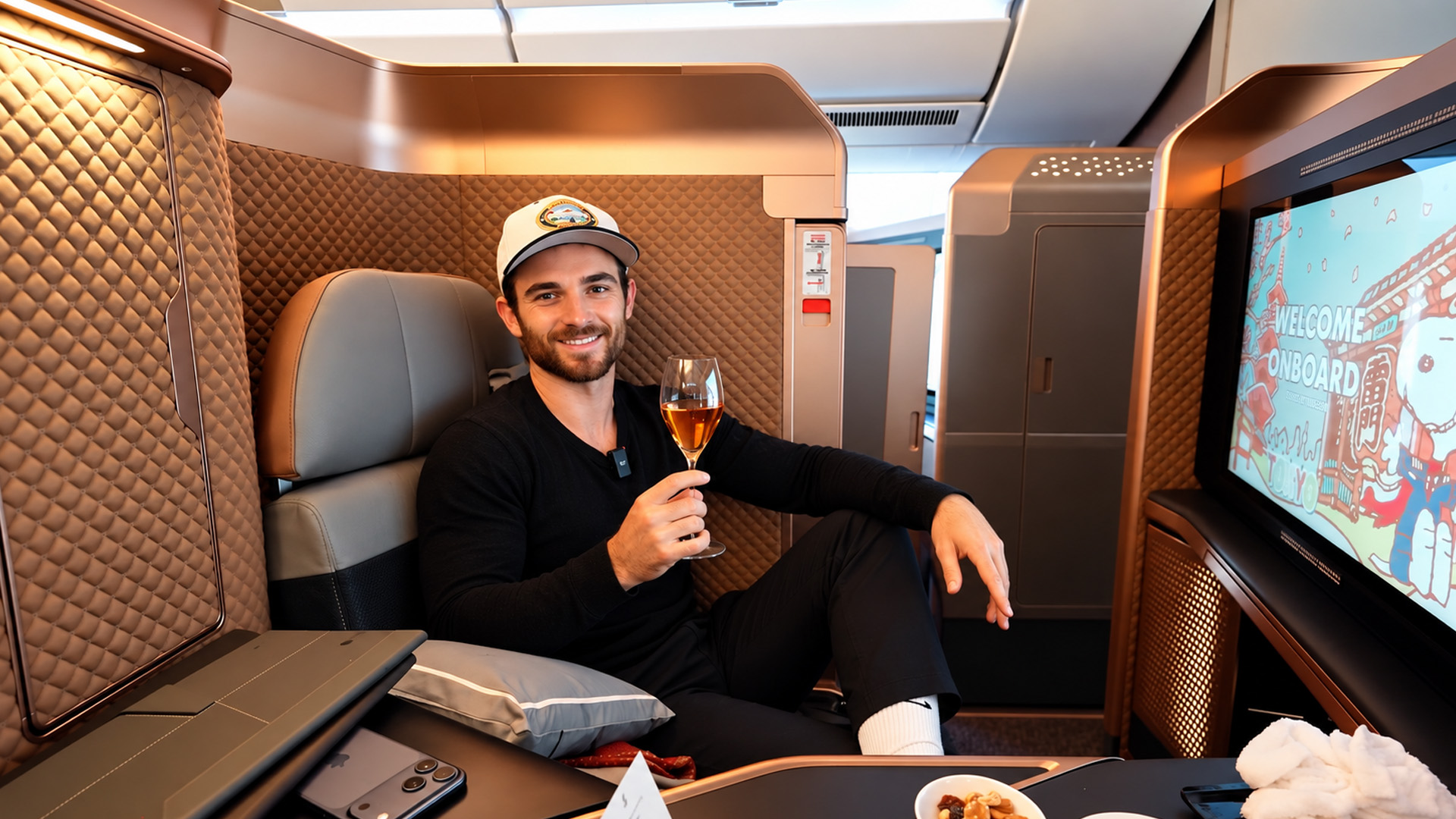 What does Starlux first class get before boarding the plane?