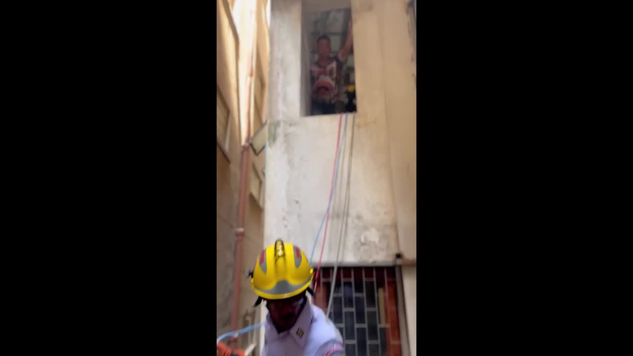 Rescue team uses ropes to save Burmese worker who fell from building ...