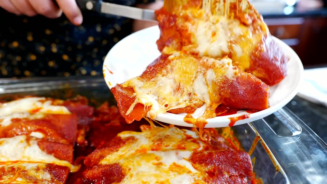 Cheesy baked Mexican breakfast enchiladas with guajillo sauce