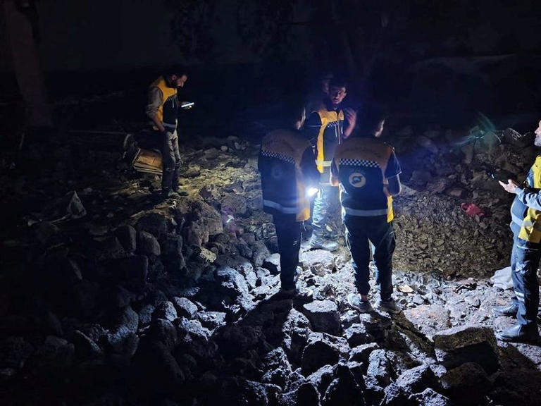 Members of the Syrian civil defence group known as the White Helmets take part in rescue operations in the aftermath of airstrikes, which Jordan said it carried out at sites it described as militant hideouts in southern Syria, at locations given as Daraa Governorate and As-Suwayda Governorate, Syria, in this handout image released October 27, 2026. The White Helmets/Handout via REUTERS