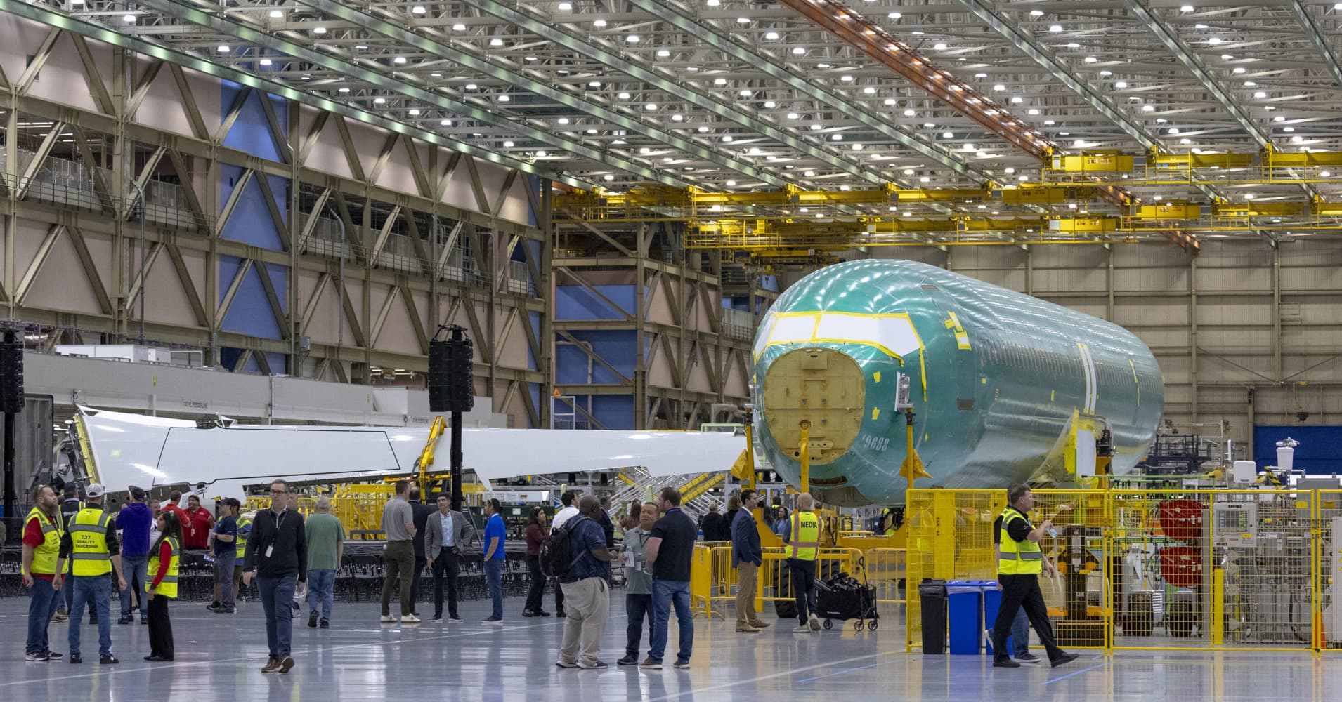 Boeing narrows third-quarter loss as defense sales rise, but focus remains on 737 Max production