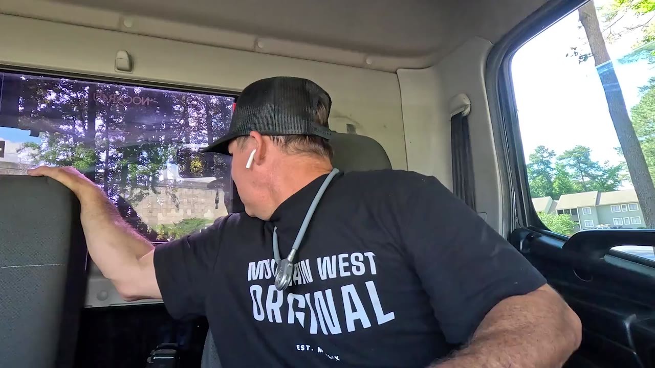 Tow truck driver removes a wrecked Dodge Ram and faces a parking dispute