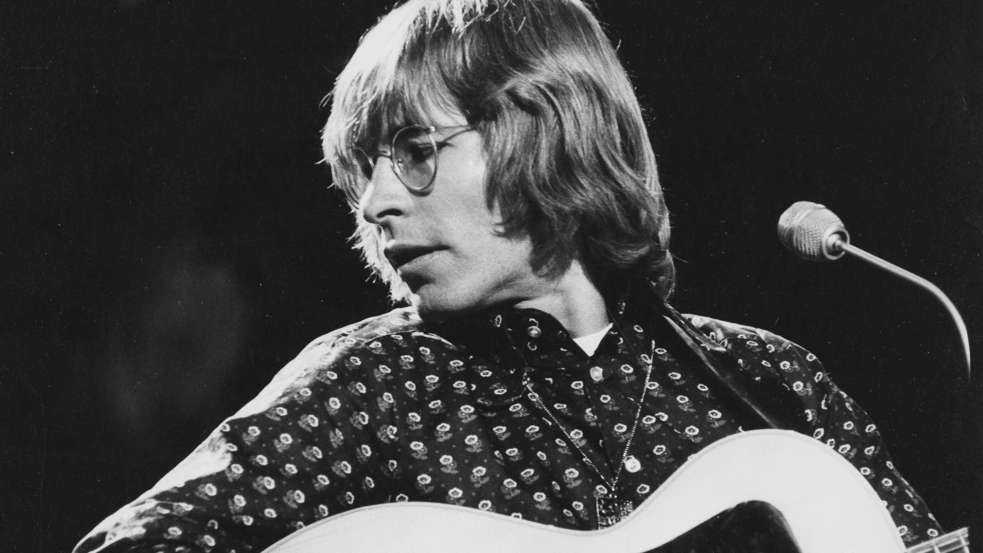 In 1973, John Denver went skiing after a rough patch with his wife—by the time his lift reached the top, he'd written a folk rock ballad for the ages