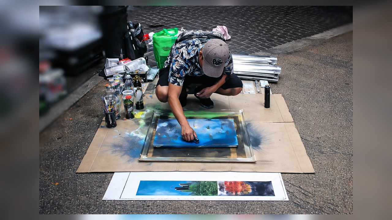 Spray painting a broken iMac during a simple fix