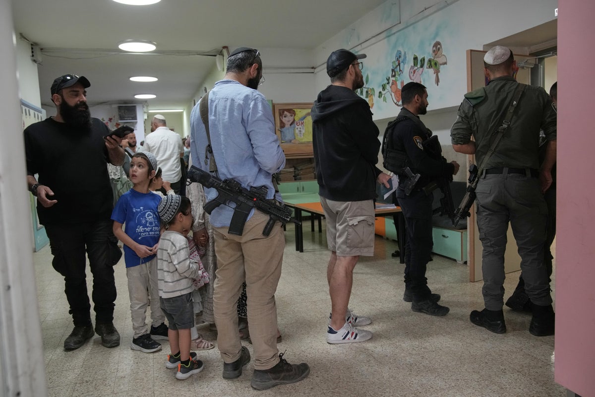 The latest: Israelis vote in a tense election seen as a referendum on ...