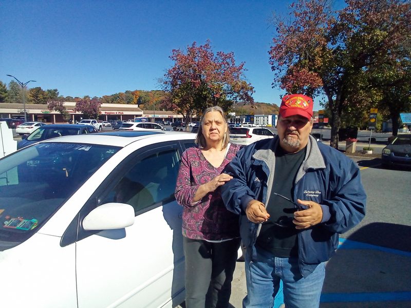 Swing voter and retired diesel mechanic Fred McDonald, 71, and his wife, Antoinette McDonald, 69, stand outside a McDonald’s restaurant in Easton, Pennsylvania, a politically divided area in the US, October 22, 2026. Picture taken with a mobile device. REUTERS/Nicholas P. Brown