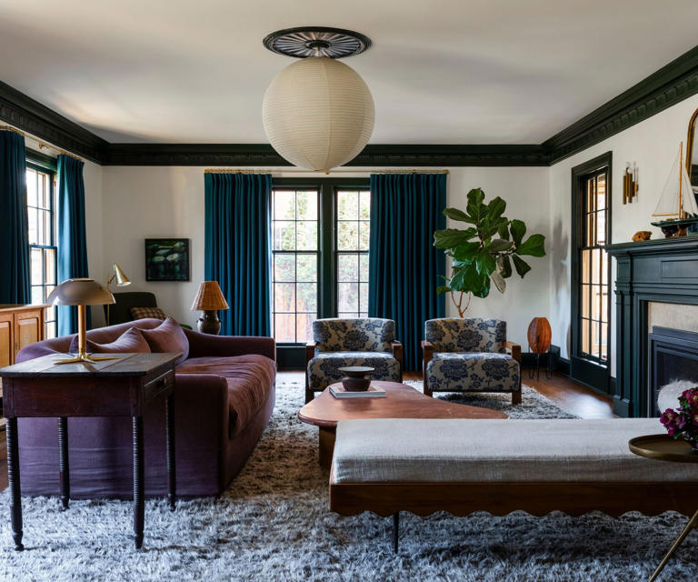 Inside a colorful living room with a moody, unexpected palette
