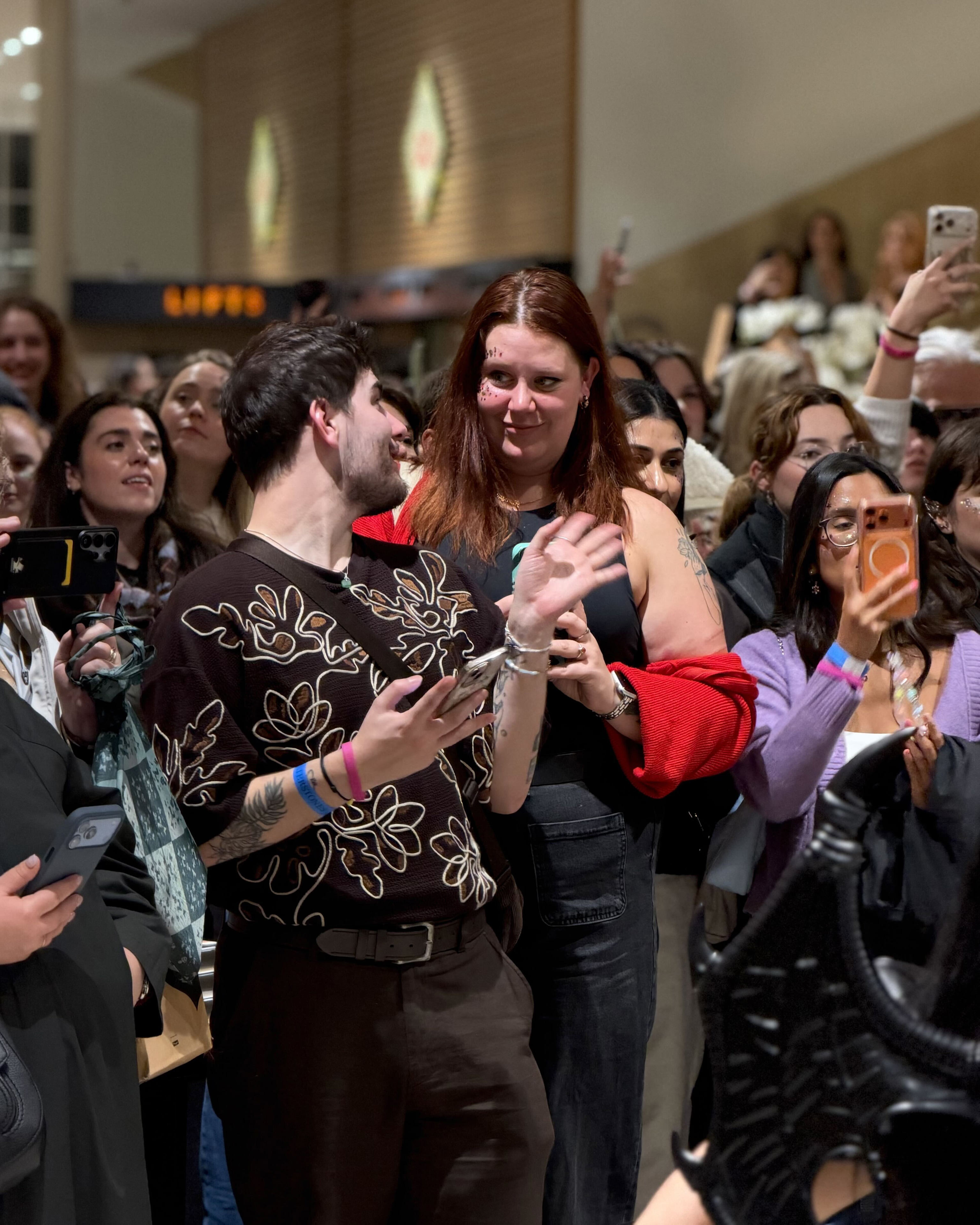 A Court of Thorns and Roses fans dress up for midnight launch parties