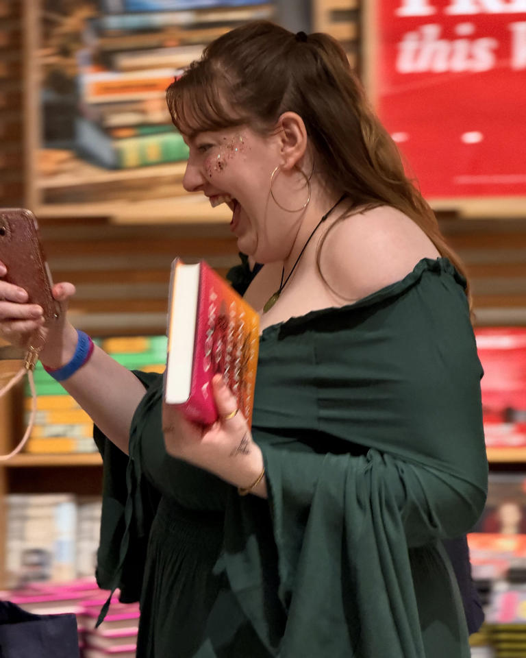 A Court of Thorns and Roses fans dress up for midnight launch parties