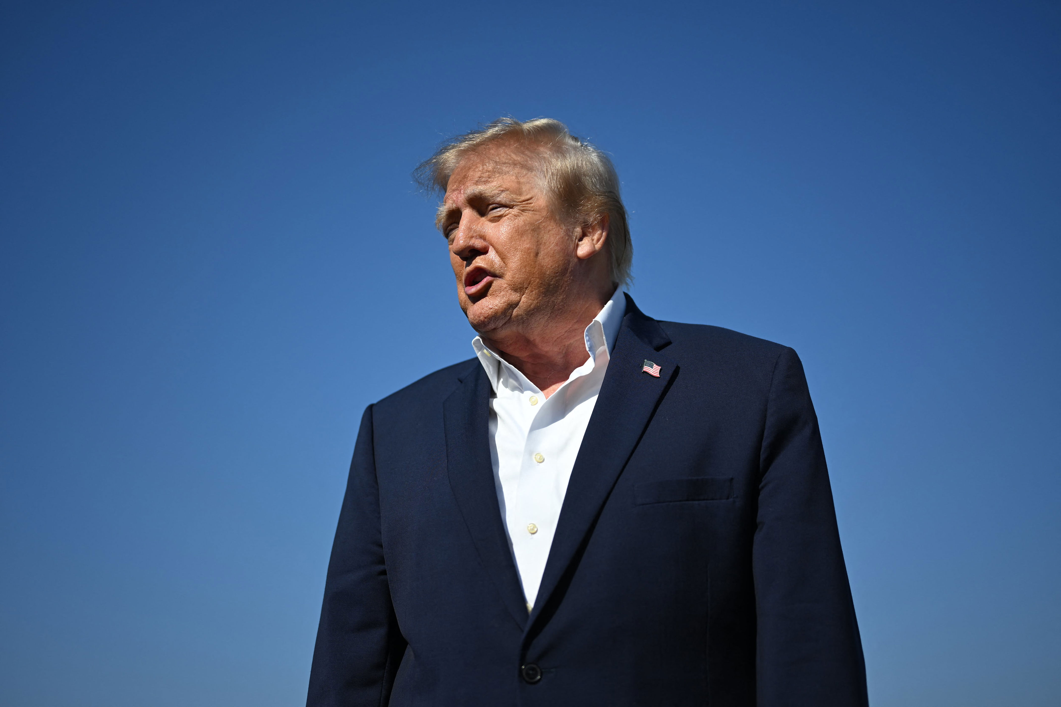Trump, 80, humiliated as fake tan makeup exposed