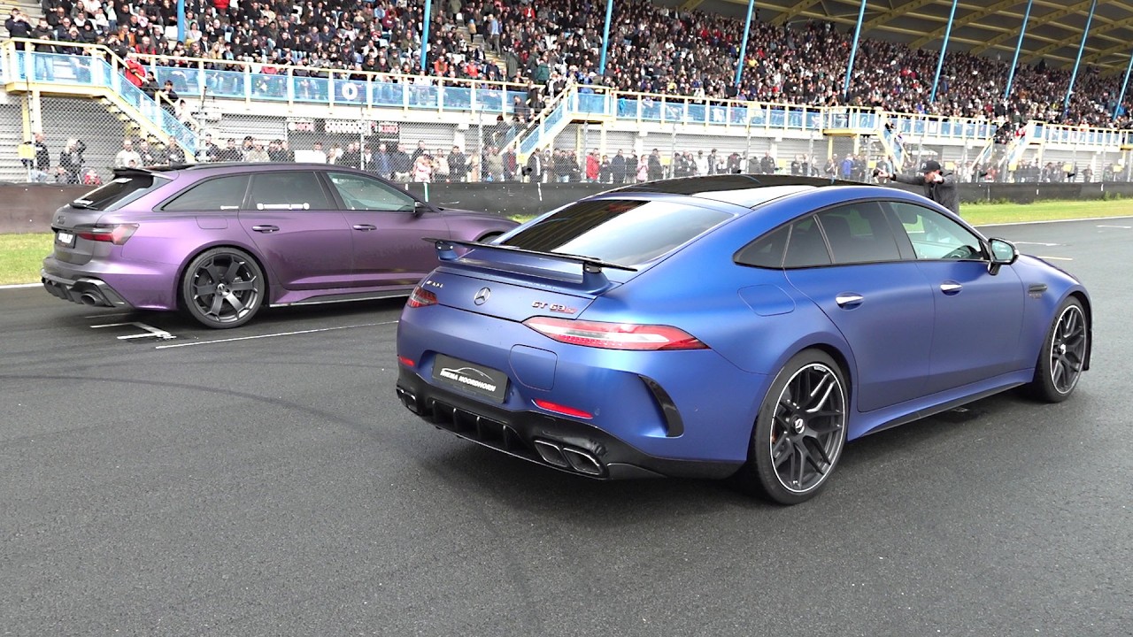 Which modified car gets down the strip first in this drag racing lineup?