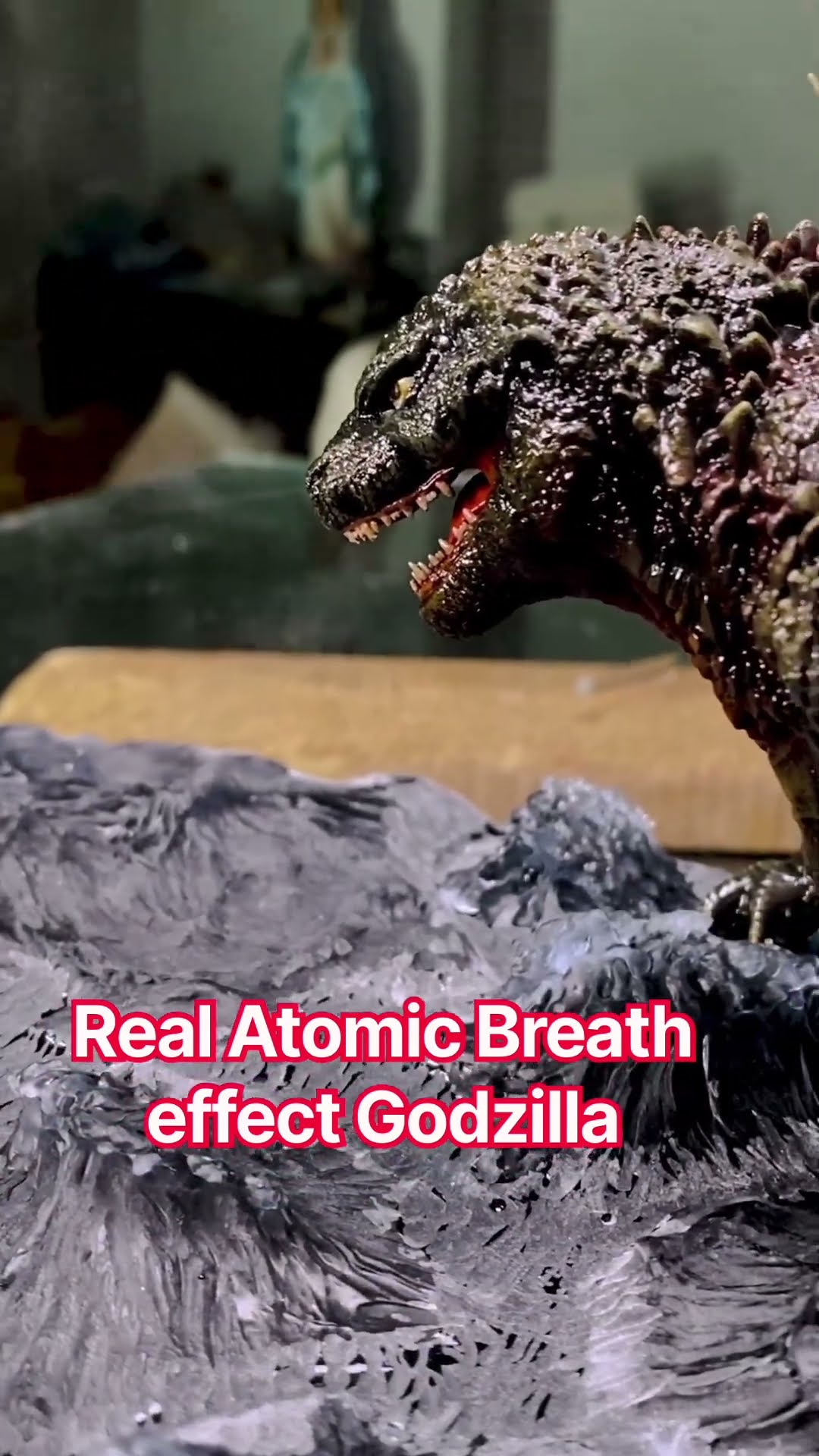 Realistic Godzilla figurine unleashes epic atomic breath effect!
