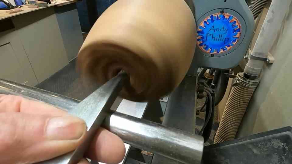 Cracks and wild grain give burr elm its character on the lathe