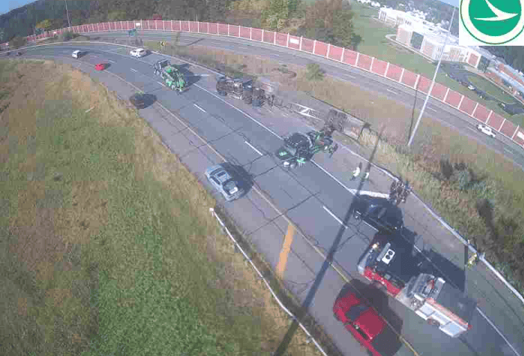 Ramp opened to one lane after semi lands on its side in I-90 crash