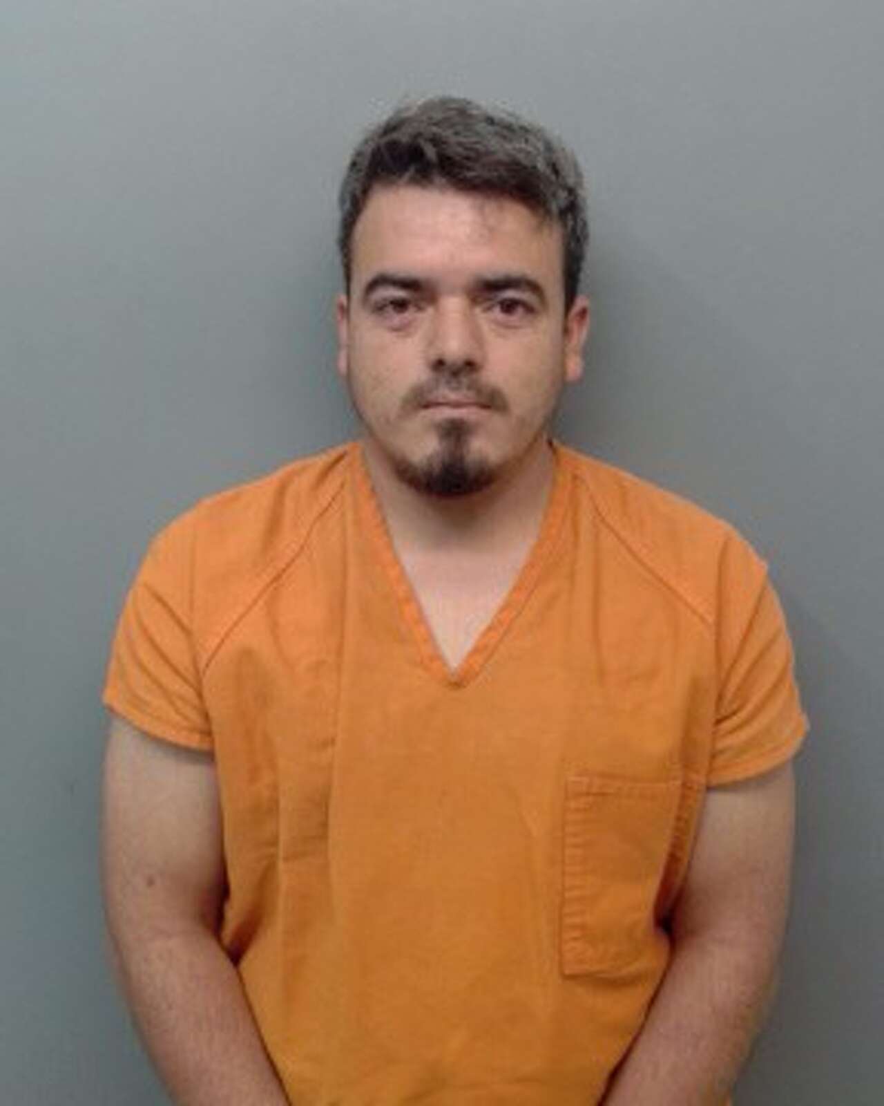 Man arrested in connection with video of dog hanging from truck