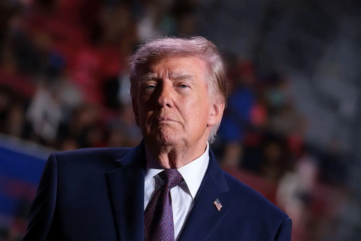 Voters boo Trump as he once more tries to buy their votes for $5,000