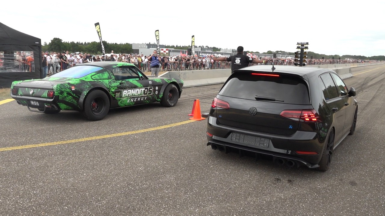 Two different generations of performance cars meet on the drag strip