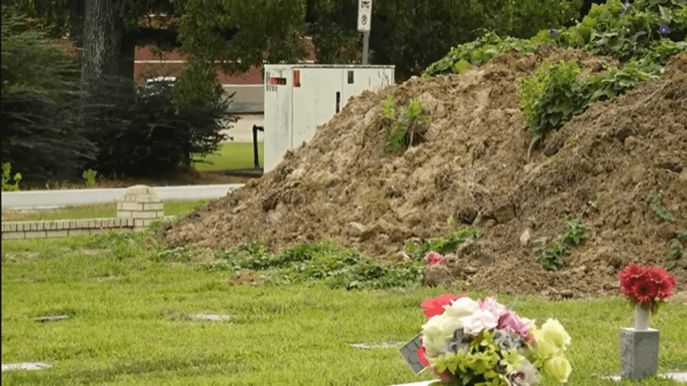 Family says father's grave missing, possibly buried under dirt pile at ...
