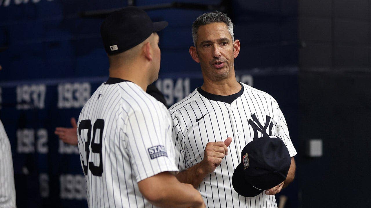 Jorge Posada and Jose Trevino of the New York Yankees talk during the Yankees' Old Timers' Day before a game against the Colorado Rockies at Yankee Stadium on Aug. 24, 2024, in New York. Getty Images